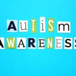 April is Autism Awareness month - words, flat lay style