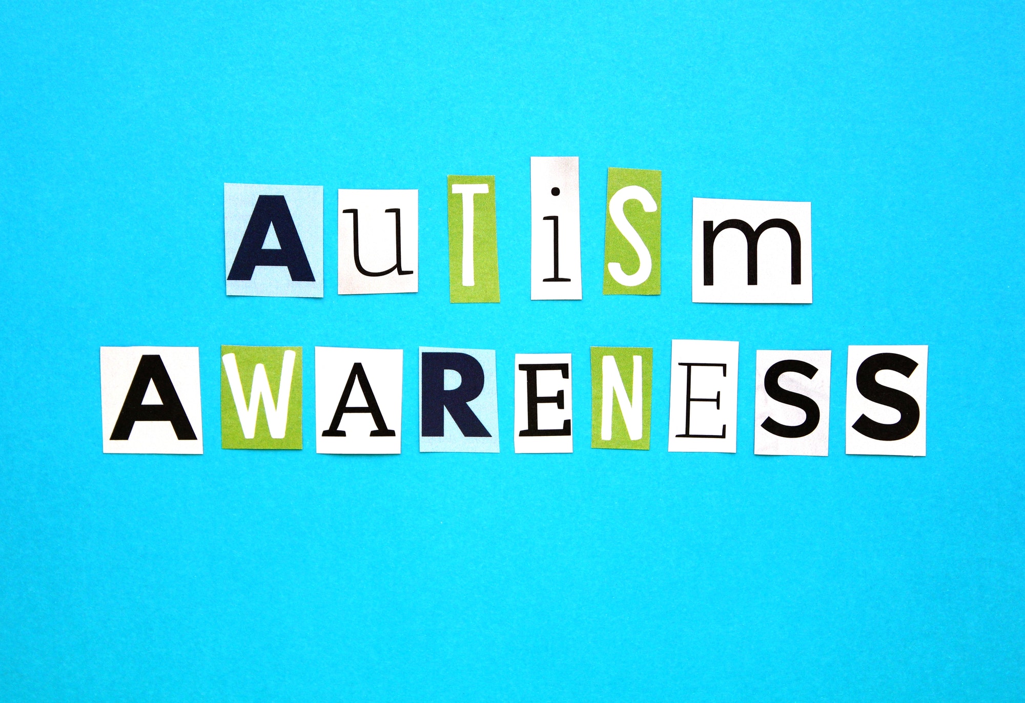 April is Autism Awareness month - words, flat lay style
