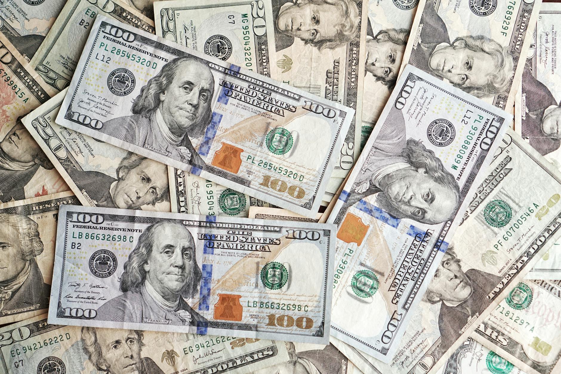 us dollar banknotes stack and pile background